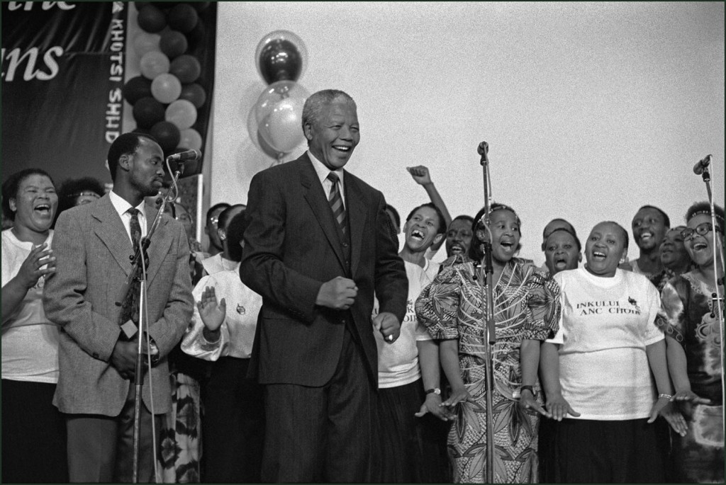 Mandela joins the A.N.C. choir in a celebratory dance at the Carlton Hotel in Johannesburg after their election victory, in 1994. Photograph by Ian Berry/Magnum.