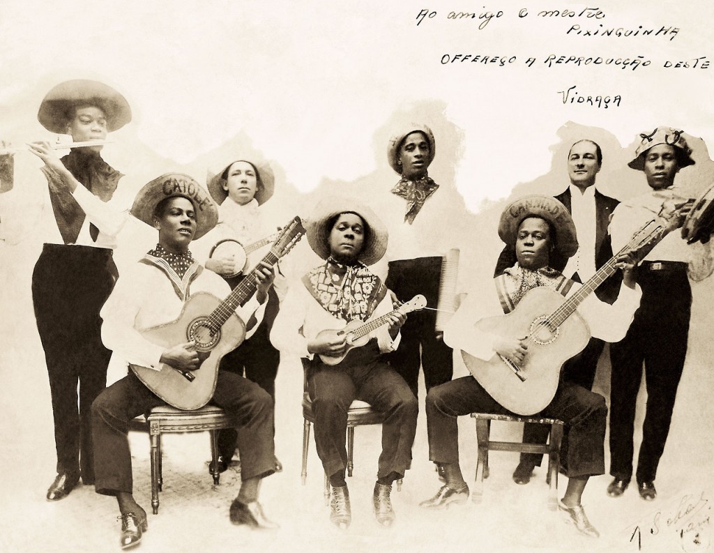 Grupo Caxangá: Pixinguinha is standing with a flute at the far left; Donga is seated with a guitar to the far right. Courtesy Acervo Instituto Moreira Salles, Coleção Pixinguinha.