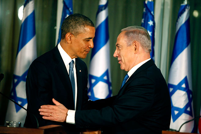 U.S. President Barack Obama (L) greets Israeli Prime Minister Benjamin Netanyahu during a press conference on March 20, 2013 in Jerusalem, Israel. Photo credit: Lior Mizrahi/Getty Images