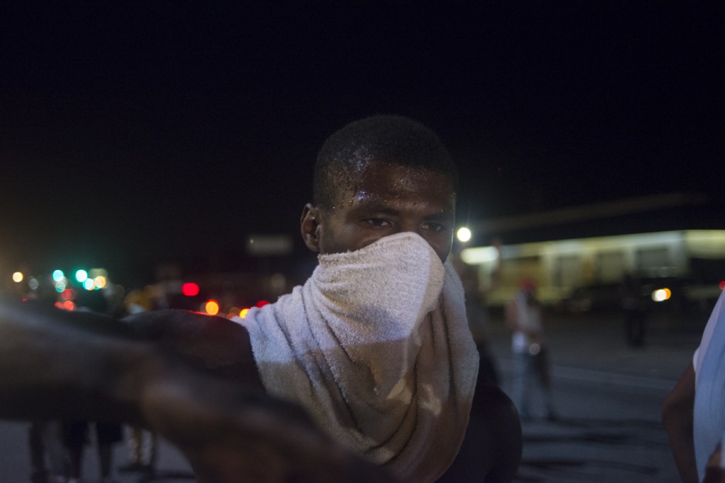 A protestor during demonstrations in Ferguson, Mo. on August 17, 2014. / Jon Lowenstein—Noor for TIME