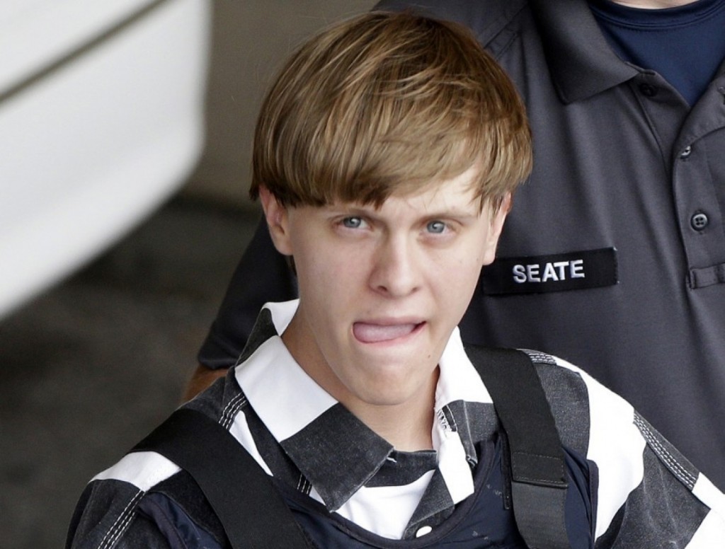 A witness said  suspected killer Dylann Storm Roof said “you rape our women” as he shot nine African Americans — including six women — in Charleston, S.C. (AP Photo/Chuck Burton)