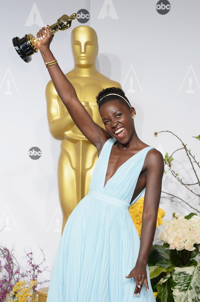 Winning her Oscar for 12 Years a Slave. Photograph: FilmMagic