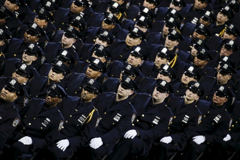 New York police officers, at the Dec. 29 graduation ceremony at Madison Square Garden in New York. (Carlo Allegri/ Reuters)